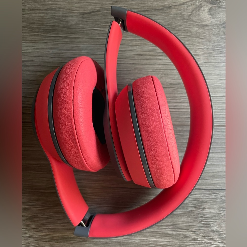 Red/Orange Beats over ear headphones